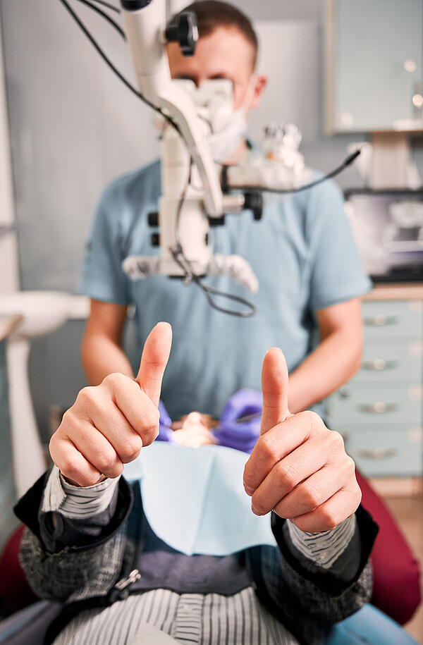 dentist, patient, thumbs up, treatment, approval, gesture, approve, like, dentistry, dental, stomatology, hand, arm, diagnostic, medical, medicine, teeth, therapy, woman, man, oral, clinic, health, healthcare, male, female, close up, blurry, exam, blurred, finger, good, examination, stomatologist, doctor, specialist, adult, procedure, wellness, cavity, checkup, examine, prophylactic, appointment, care, caries
